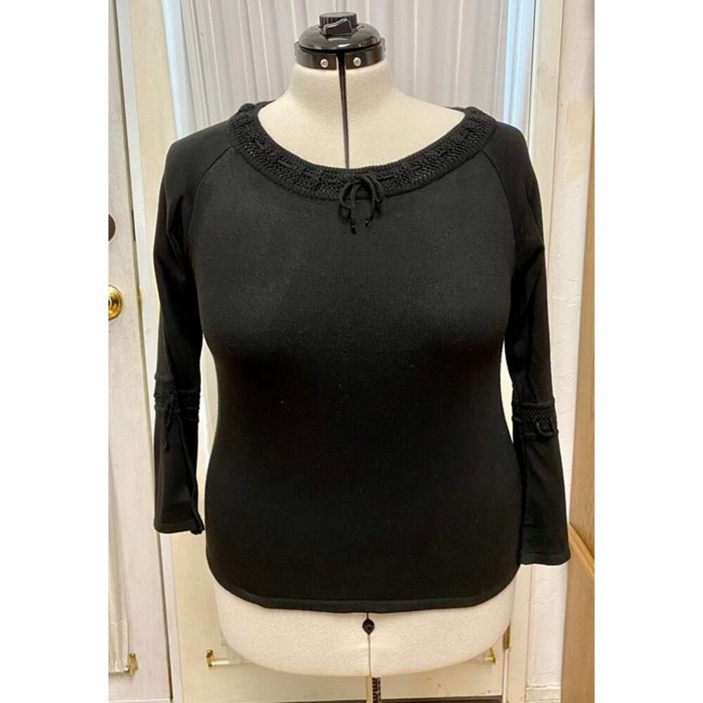Nina Leonard. Size large.